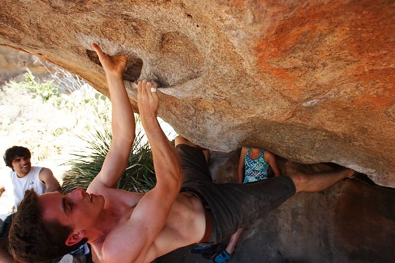 Raanan Robertson rock climbing on No One Gets Out of Here Alive (V2) in Hueco Tanks State Park and Historic Site during the Hueco Tanks Awesome Fest 2010 trip, Saturday, May 22, 2010.

Filename: SRM_20100522_15281850.JPG
Aperture: f/5.6
Shutter Speed: 1/400
Body: Canon EOS-1D Mark II
Lens: Canon EF 16-35mm f/2.8 L