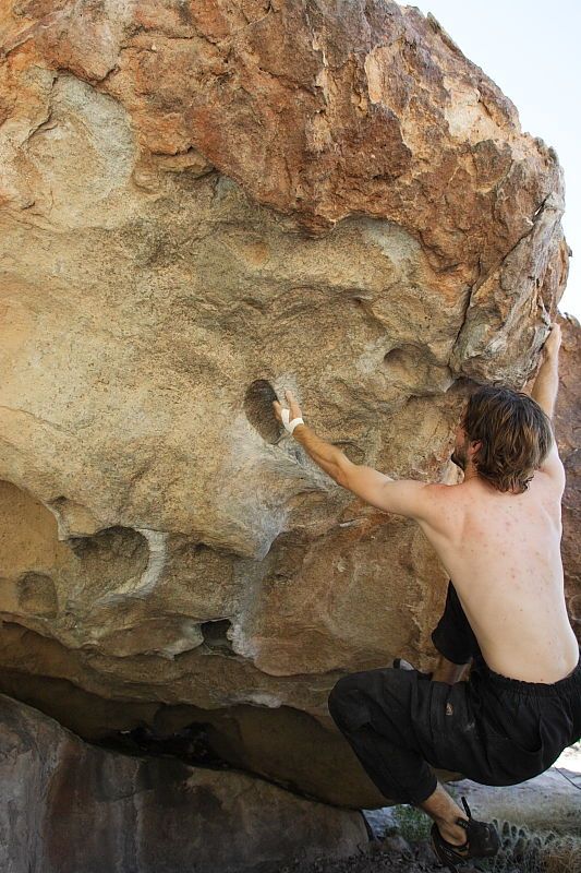 Andrew Dreher rock climbing on No One Gets Out of Here Alive (V2) in Hueco Tanks State Park and Historic Site during the Hueco Tanks Awesome Fest 2010 trip, Sunday, May 23, 2010.
Filename: SRM_20100523_10520352.JPG
Aperture: f/5.6
Shutter Speed: 1/640
Body: Canon EOS-1D Mark II
Lens: Canon EF 16-35mm f/2.8 L