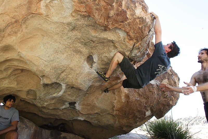 Raanan Robertson rock climbing on No One Gets Out of Here Alive (V2) in Hueco Tanks State Park and Historic Site during the Hueco Tanks Awesome Fest 2010 trip, Sunday, May 23, 2010.
Filename: SRM_20100523_10565999.JPG
Aperture: f/5.6
Shutter Speed: 1/640
Body: Canon EOS-1D Mark II
Lens: Canon EF 16-35mm f/2.8 L