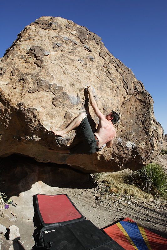 Raanan Robertson rock climbing barefoot on No One Gets Out of Here Alive (V2) in Hueco Tanks State Park and Historic Site during the Hueco Tanks Awesome Fest 2010 trip, Sunday, May 23, 2010.
Filename: SRM_20100523_18405486.JPG
Aperture: f/8.0
Shutter Speed: 1/1000
Body: Canon EOS-1D Mark II
Lens: Canon EF 16-35mm f/2.8 L
