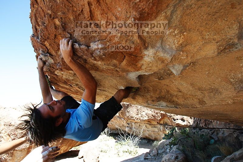 Javier Morales rock climbing on Mexican Chicken (V6) in Hueco Tanks State Park and Historic Site during the Hueco Tanks Awesome Fest 2010 trip, Monday, May 24, 2010.

Filename: SRM_20100524_11553399.JPG
Aperture: f/4.0
Shutter Speed: 1/1250
Body: Canon EOS-1D Mark II
Lens: Canon EF 16-35mm f/2.8 L