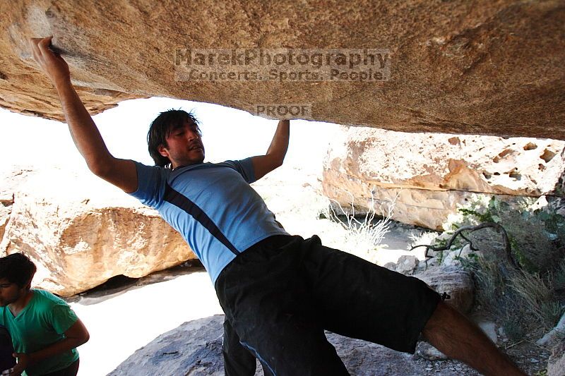 Javier Morales rock climbing on Mexican Chicken (V6) in Hueco Tanks State Park and Historic Site during the Hueco Tanks Awesome Fest 2010 trip, Monday, May 24, 2010.
Filename: SRM_20100524_12144114.JPG
Aperture: f/4.0
Shutter Speed: 1/2500
Body: Canon EOS-1D Mark II
Lens: Canon EF 16-35mm f/2.8 L