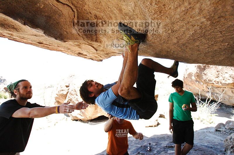 Javier Morales rock climbing on Mexican Chicken (V6) in Hueco Tanks State Park and Historic Site during the Hueco Tanks Awesome Fest 2010 trip, Monday, May 24, 2010.
Filename: SRM_20100524_12144915.JPG
Aperture: f/4.0
Shutter Speed: 1/2500
Body: Canon EOS-1D Mark II
Lens: Canon EF 16-35mm f/2.8 L