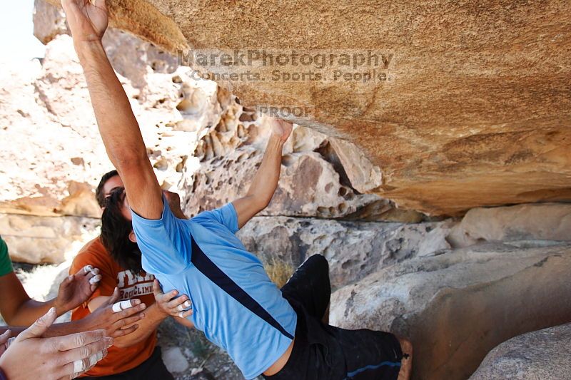 Javier Morales rock climbing on Mexican Chicken (V6) in Hueco Tanks State Park and Historic Site during the Hueco Tanks Awesome Fest 2010 trip, Monday, May 24, 2010.
Filename: SRM_20100524_12173922.JPG
Aperture: f/4.0
Shutter Speed: 1/400
Body: Canon EOS-1D Mark II
Lens: Canon EF 16-35mm f/2.8 L
