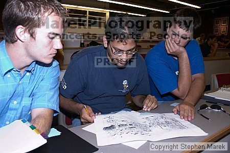 Aaron Bolduc, Aakash Juviwala and Daniel Brooks look over the plans for the new 5th Street Bridge.

Filename: crw_0810_std.jpg
Aperture: f/5.0
Shutter Speed: 1/60
Body: Canon EOS DIGITAL REBEL
Lens: Canon EF-S 18-55mm f/3.5-5.6