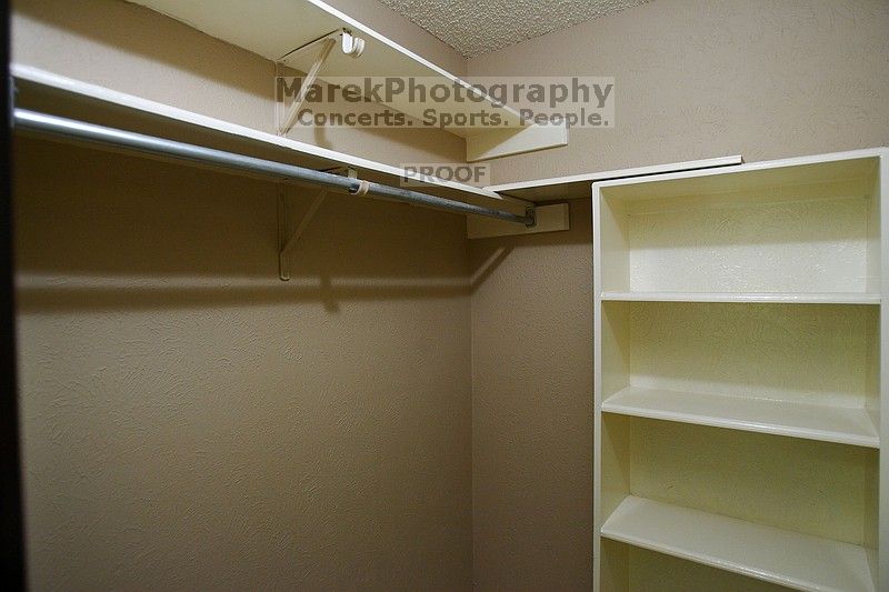 View of the master walk-in closet from the bathroom.
Filename: SRM_20101228_17503951.JPG
Aperture: f/2.8
Shutter Speed: 1/60
Body: Canon EOS-1D Mark II
Lens: Canon EF 16-35mm f/2.8 L