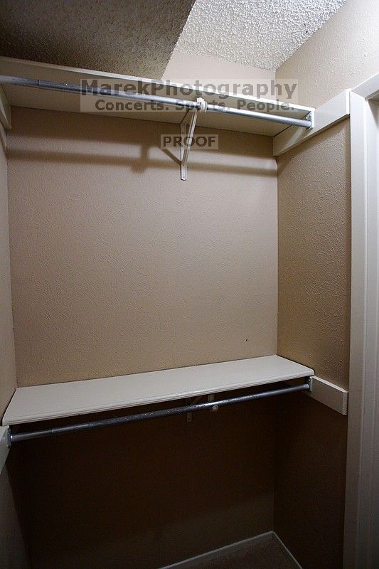 View of downstairs bedroom walk-in closet.

Filename: SRM_20101228_18014375.JPG
Aperture: f/2.8
Shutter Speed: 1/80
Body: Canon EOS-1D Mark II
Lens: Canon EF 16-35mm f/2.8 L