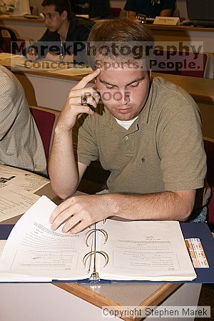 Andrew Howard looks over the Women's LAX bill request for new jerseys.

Filename: crw_0305_std.jpg
Aperture: f/6.3
Shutter Speed: 1/80
Body: Canon EOS DIGITAL REBEL
Lens: Canon EF-S 18-55mm f/3.5-5.6