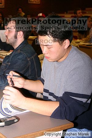 Weekly meeting of the Undergraduate House of Representatives (UHR), February 10, 2004.

Filename: img_1304_std.jpg
Aperture: f/6.3
Shutter Speed: 1/60
Body: Canon EOS DIGITAL REBEL
Lens: Canon EF-S 18-55mm f/3.5-5.6