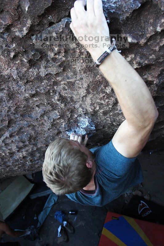 Rock climbing in Hueco Tanks State Park and Historic Site during the Hueco Tanks Awesome Fest 2.0 trip, Sunday, September 05, 2010.

Filename: SRM_20100905_19144430.JPG
Aperture: f/4.0
Shutter Speed: 1/200
Body: Canon EOS 20D
Lens: Canon EF 16-35mm f/2.8 L