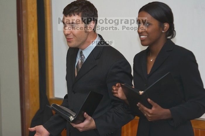 Eric Cullather and Nichole Martin practice their Duo Interpretive of "This Is How It Goes" by Neil Labute.  The University of Texas' Speech Team will compete in the American Forensic Association�s National Individual Events Tournament (AFA NIET) in Gainesv

Filename: SRM_20060325_143046_0.jpg
Aperture: f/3.5
Shutter Speed: 1/160
Body: Canon EOS 20D
Lens: Canon EF 80-200mm f/2.8 L