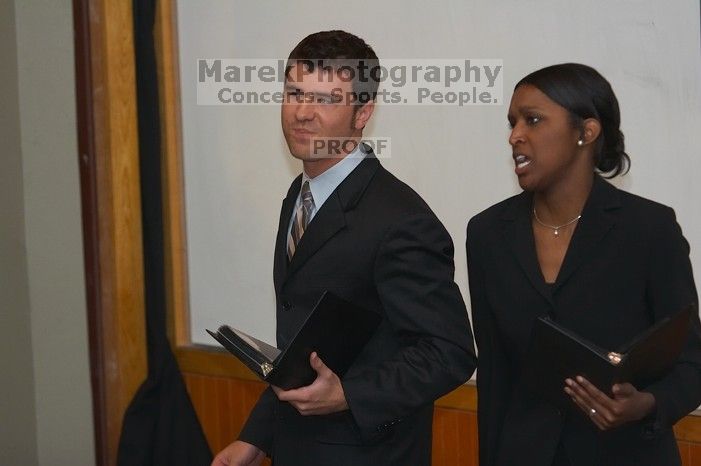 Eric Cullather and Nichole Martin practice their Duo Interpretive of "This Is How It Goes" by Neil Labute. The University of Texas' Speech Team will compete in the American Forensic Association’s National Individual Events Tournament (AFA NIET) in Gainesv
Filename: SRM_20060325_143546_2.jpg
Aperture: f/3.5
Shutter Speed: 1/160
Body: Canon EOS 20D
Lens: Canon EF 80-200mm f/2.8 L