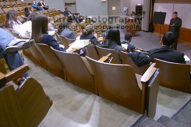 Drew Farmer practicing his informative speech on bridging the digital gap with the $100 computer.  The University of Texas' Speech Team will compete in the American Forensic Association’s National Individual Events Tournament (AFA NIET) in Gainesville, Florida, March 30 through April 4.

Filename: SRM_20060325_124826_1.jpg
Aperture: f/3.5
Shutter Speed: 1/20
Body: Canon EOS DIGITAL REBEL
Lens: Canon EF-S 18-55mm f/3.5-5.6