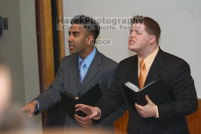 Jesse Gall and Bimal Patel rehearse their Duo Interpretive of "Promises" by B.Z. Goldberg and Justine Shapiro.  The University of Texas' Speech Team will compete in the American Forensic Association�s National Individual Events Tournament (AFA NIET) in Gai

Filename: SRM_20060325_142430_1.jpg
Aperture: f/3.5
Shutter Speed: 1/160
Body: Canon EOS 20D
Lens: Canon EF 80-200mm f/2.8 L