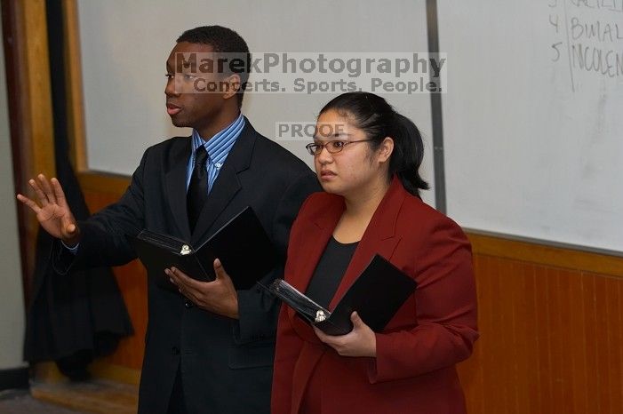 Donald Collier and Sally Rivero rehearse their Duo Interpretation of "Architecture of Loss," by Julia Cho.  The University of Texas' Speech Team will compete in the American Forensic Association�s National Individual Events Tournament (AFA NIET) in Gainesv

Filename: SRM_20060325_135952_6.jpg
Aperture: f/3.5
Shutter Speed: 1/160
Body: Canon EOS 20D
Lens: Canon EF 80-200mm f/2.8 L
