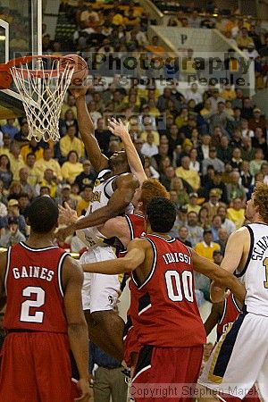 Isma'il Muhammad shoots against UGA.  Men's Basketball Georgia Tech beat UGA 87-49.

Filename: crw_5984_std.jpg
Aperture: f/2.8
Shutter Speed: 1/640
Body: Canon EOS DIGITAL REBEL
Lens: Canon EF 80-200mm f/2.8 L
