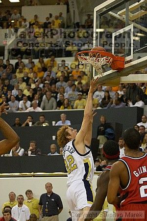 Luke Schenscher takes a shot against UGA.  Men's Basketball Georgia Tech beat UGA 87-49.

Filename: crw_5922_std.jpg
Aperture: f/2.8
Shutter Speed: 1/640
Body: Canon EOS DIGITAL REBEL
Lens: Canon EF 80-200mm f/2.8 L