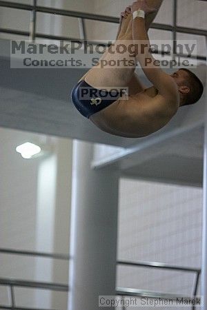 Diver Pete Doblar competes against the University of Tennessee.

Filename: crw_2248_std.jpg
Aperture: f/2.8
Shutter Speed: 1/640
Body: Canon EOS DIGITAL REBEL
Lens: Canon EF 80-200mm f/2.8 L