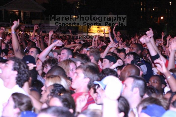 Ludacris performing on the first day of Music Midtown, 2004.

Filename: IMG_6213.jpg
Aperture: f/2.8
Shutter Speed: 1/80
Body: Canon EOS DIGITAL REBEL
Lens: Canon EF 50mm f/1.8 II