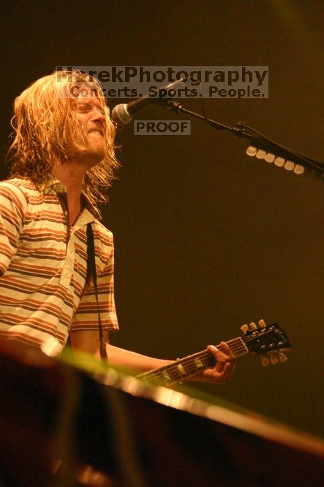 Puddle of Mudd performs on the first day of Music Midtown, 2004.

Filename: IMG_6052.jpg
Aperture: f/2.8
Shutter Speed: 1/160
Body: Canon EOS DIGITAL REBEL
Lens: Canon EF 80-200mm f/2.8 L