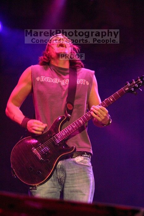 Puddle of Mudd performs on the 99X stage on the first day of Music Midtown, 2004.
Filename: IMG_6092.jpg
Aperture: f/2.8
Shutter Speed: 1/160
Body: Canon EOS DIGITAL REBEL
Lens: Canon EF 80-200mm f/2.8 L