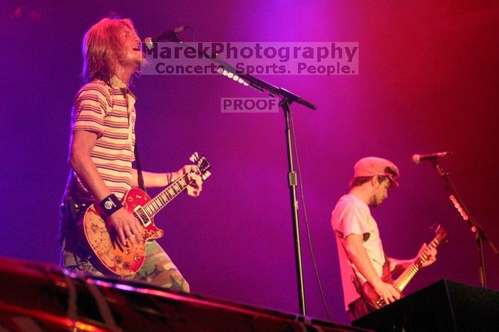 Puddle of Mudd performs on the 99X stage on the first day of Music Midtown, 2004.
Filename: IMG_6091.jpg
Aperture: f/2.8
Shutter Speed: 1/160
Body: Canon EOS DIGITAL REBEL
Lens: Canon EF 80-200mm f/2.8 L