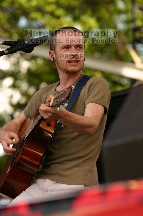 Damien Rice performs on the 99X stage on the second day of Music Midtown, 2004.

Filename: IMG_6339.jpg
Aperture: f/4.5
Shutter Speed: 1/320
Body: Canon EOS DIGITAL REBEL
Lens: Canon EF 80-200mm f/2.8 L