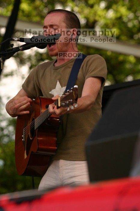 Damien Rice performs on the 99X stage on the second day of Music Midtown, 2004.

Filename: IMG_6376.jpg
Aperture: f/5.6
Shutter Speed: 1/320
Body: Canon EOS DIGITAL REBEL
Lens: Canon EF 80-200mm f/2.8 L