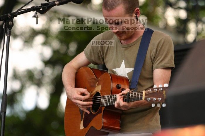 Damien Rice performs on the 99X stage on the second day of Music Midtown, 2004.

Filename: IMG_6329.jpg
Aperture: f/3.5
Shutter Speed: 1/320
Body: Canon EOS DIGITAL REBEL
Lens: Canon EF 80-200mm f/2.8 L