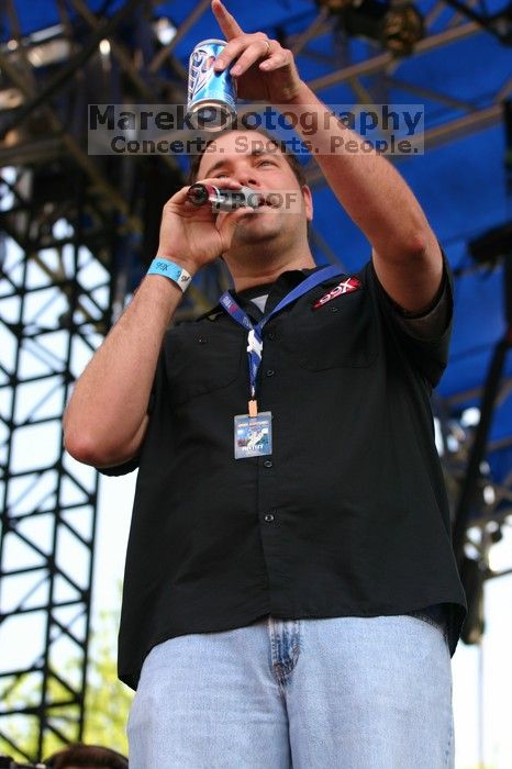 Damien Rice performs on the 99X stage on the second day of Music Midtown, 2004.

Filename: IMG_6298.jpg
Aperture: f/4.5
Shutter Speed: 1/250
Body: Canon EOS DIGITAL REBEL
Lens: Canon EF 80-200mm f/2.8 L