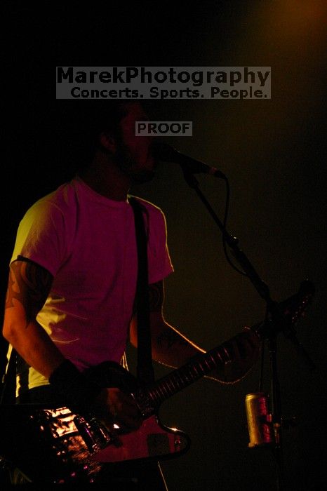 The Foo Fighters perform on the 99X stage on the second day of Music Midtown, 2004.

Filename: IMG_6750.jpg
Aperture: f/2.8
Shutter Speed: 1/200
Body: Canon EOS DIGITAL REBEL
Lens: Canon EF 80-200mm f/2.8 L