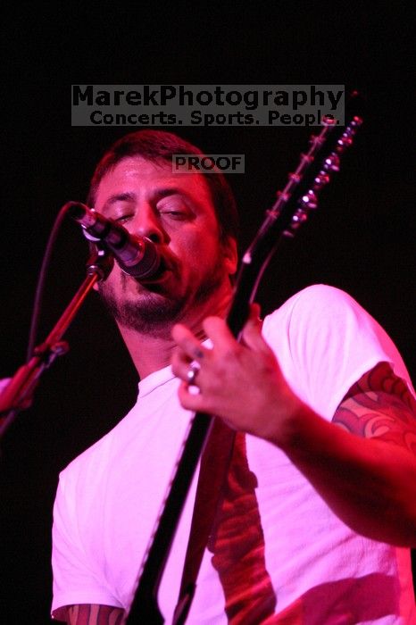 The Foo Fighters perform on the 99X stage on the second day of Music Midtown, 2004.
Filename: IMG_6777.jpg
Aperture: f/2.8
Shutter Speed: 1/160
Body: Canon EOS DIGITAL REBEL
Lens: Canon EF 80-200mm f/2.8 L