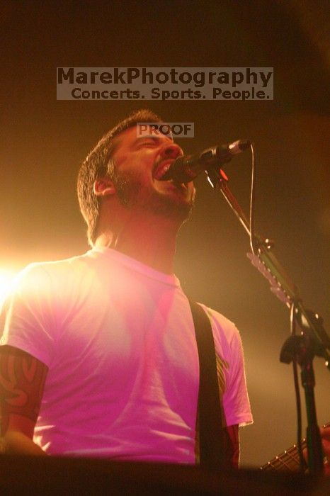 The Foo Fighters perform on the 99X stage on the second day of Music Midtown, 2004.
Filename: IMG_6758.jpg
Aperture: f/3.2
Shutter Speed: 1/250
Body: Canon EOS DIGITAL REBEL
Lens: Canon EF 80-200mm f/2.8 L