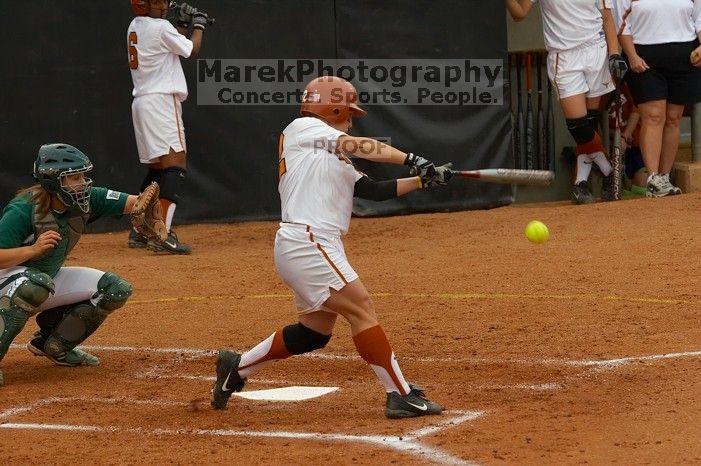 #22, Tina Boutelle, at bat against the Mean Green.  The Lady Longhorns beat the University of North Texas 5-0 in the first game of the double header Wednesday night.

Filename: SRM_20060308_204633_5.jpg
Aperture: f/4.5
Shutter Speed: 1/800
Body: Canon EOS 20D
Lens: Canon EF 80-200mm f/2.8 L