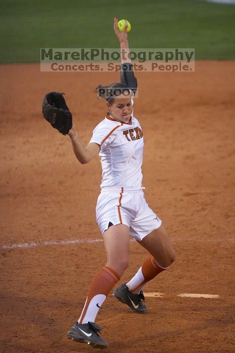Cat Osterman pitching to the Mean Green. The Lady Longhorns beat the University of North Texas 5-0 in the first game of the double header Wednesday night.
Filename: SRM_20060308_212130_4.jpg
Aperture: f/2.8
Shutter Speed: 1/1000
Body: Canon EOS 20D
Lens: Canon EF 80-200mm f/2.8 L