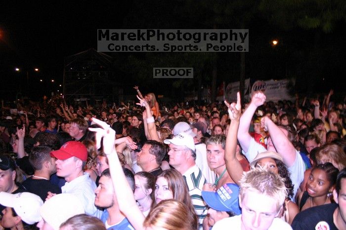 The Foo Fighters perform on the 99X stage on the second day of Music Midtown, 2004.

Filename: IMG_6847.jpg
Aperture: f/3.5
Shutter Speed: 1/125
Body: Canon EOS DIGITAL REBEL
Lens: Canon EF-S 18-55mm f/3.5-5.6