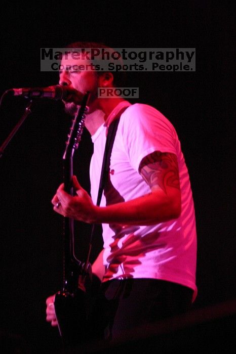 The Foo Fighters perform on the 99X stage on the second day of Music Midtown, 2004.

Filename: IMG_6831.jpg
Aperture: f/2.8
Shutter Speed: 1/250
Body: Canon EOS DIGITAL REBEL
Lens: Canon EF 80-200mm f/2.8 L