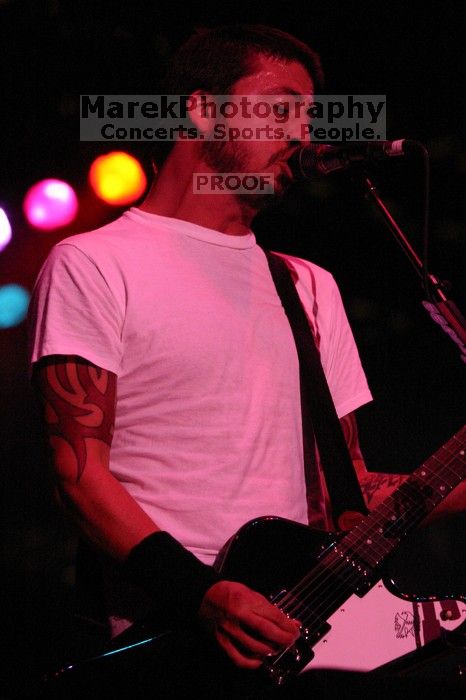 The Foo Fighters perform on the 99X stage on the second day of Music Midtown, 2004.
Filename: IMG_6821.jpg
Aperture: f/5.0
Shutter Speed: 1/250
Body: Canon EOS DIGITAL REBEL
Lens: Canon EF 80-200mm f/2.8 L