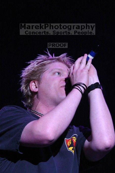 The Offspring performs on the 99X stage on the second day of Music Midtown, 2004.

Filename: IMG_6691.jpg
Aperture: f/4.0
Shutter Speed: 1/250
Body: Canon EOS DIGITAL REBEL
Lens: Canon EF 80-200mm f/2.8 L