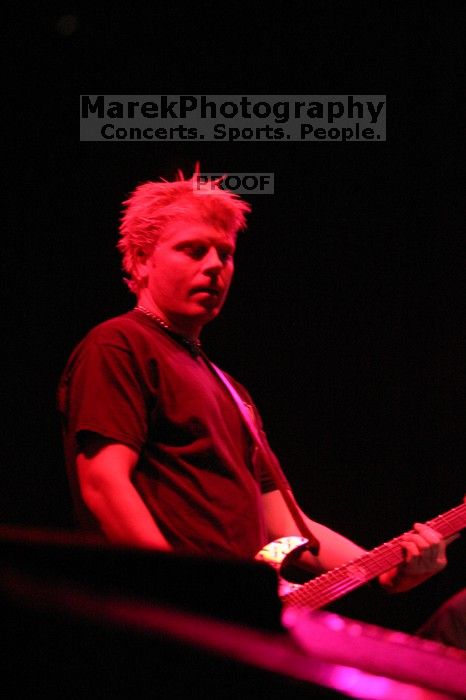 The Offspring performs on the 99X stage on the second day of Music Midtown, 2004.

Filename: IMG_6657.jpg
Aperture: f/2.8
Shutter Speed: 1/250
Body: Canon EOS DIGITAL REBEL
Lens: Canon EF 80-200mm f/2.8 L