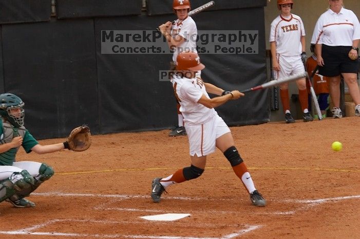 #44, Desiree Williams, hit a home run against the Mean Green.  The Lady Longhorns beat the University of North Texas 5-0 in the first game of the double header Wednesday night.

Filename: SRM_20060308_204954_0.jpg
Aperture: f/4.5
Shutter Speed: 1/500
Body: Canon EOS 20D
Lens: Canon EF 80-200mm f/2.8 L