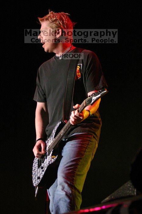 The Offspring performs on the 99X stage on the second day of Music Midtown, 2004.

Filename: IMG_6668.jpg
Aperture: f/2.8
Shutter Speed: 1/250
Body: Canon EOS DIGITAL REBEL
Lens: Canon EF 80-200mm f/2.8 L