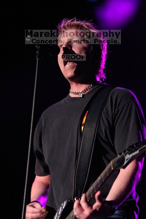 The Offspring performs on the 99X stage on the second day of Music Midtown, 2004.

Filename: IMG_6712.jpg
Aperture: f/2.8
Shutter Speed: 1/250
Body: Canon EOS DIGITAL REBEL
Lens: Canon EF 80-200mm f/2.8 L