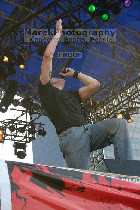 Trapt performs on the 99X stage on the second day of Music Midtown, 2004.
Filename: IMG_6510.jpg
Aperture: f/8.0
Shutter Speed: 1/125
Body: Canon EOS DIGITAL REBEL
Lens: Canon EF-S 18-55mm f/3.5-5.6