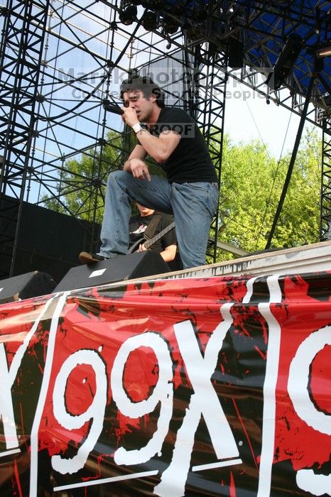 Trapt performs on the 99X stage on the second day of Music Midtown, 2004.
Filename: IMG_6513.jpg
Aperture: f/10.0
Shutter Speed: 1/125
Body: Canon EOS DIGITAL REBEL
Lens: Canon EF-S 18-55mm f/3.5-5.6