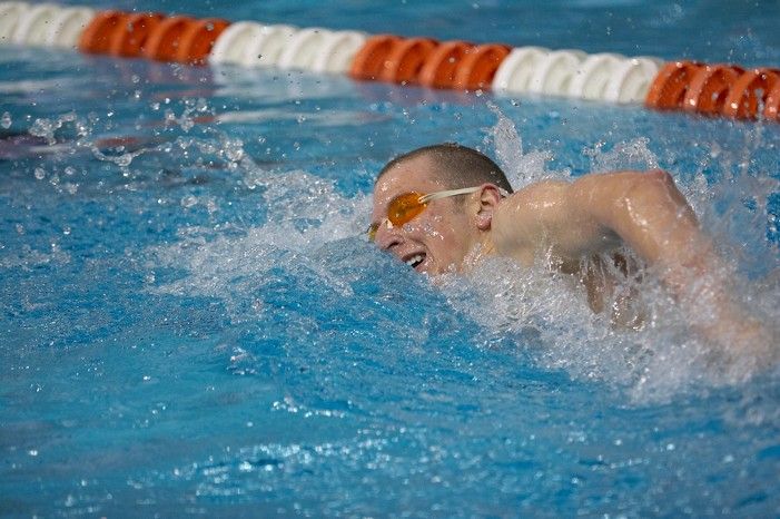 Scott Drews of the University of Texas Men's Varsity Swim Team placed 5th in the 1st heat of the 1650 Freestyle Finals with a time of 15:38.65 at the Speedo American Short Course Championships.
Filename: SRM_20060304_185130_2.jpg
Aperture: f/2.8
Shutter Speed: 1/1000
Body: Canon EOS 20D
Lens: Canon EF 80-200mm f/2.8 L