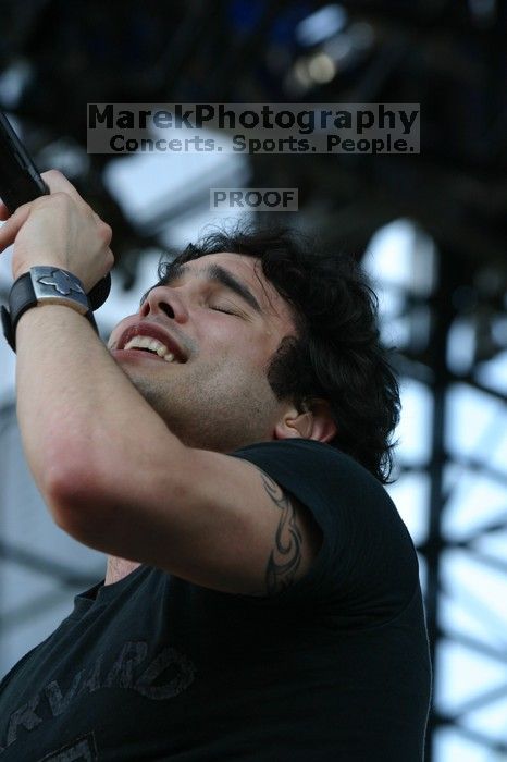 Trapt performs on the 99X stage on the second day of Music Midtown, 2004.
Filename: IMG_6546.jpg
Aperture: f/6.3
Shutter Speed: 1/320
Body: Canon EOS DIGITAL REBEL
Lens: Canon EF 80-200mm f/2.8 L