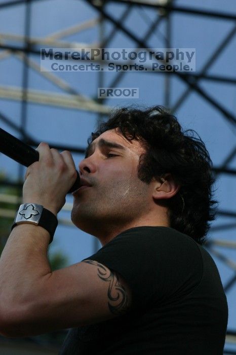 Trapt performs on the 99X stage on the second day of Music Midtown, 2004.
Filename: IMG_6561.jpg
Aperture: f/10.0
Shutter Speed: 1/320
Body: Canon EOS DIGITAL REBEL
Lens: Canon EF 80-200mm f/2.8 L