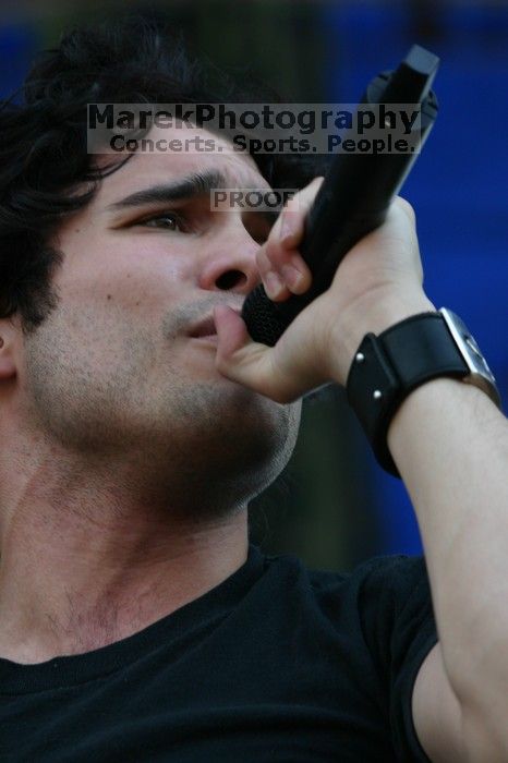 Trapt performs on the 99X stage on the second day of Music Midtown, 2004.

Filename: IMG_6527.jpg
Aperture: f/6.3
Shutter Speed: 1/320
Body: Canon EOS DIGITAL REBEL
Lens: Canon EF 80-200mm f/2.8 L