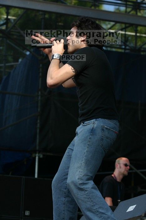 Trapt performs on the 99X stage on the second day of Music Midtown, 2004.

Filename: IMG_6429.jpg
Aperture: f/5.6
Shutter Speed: 1/320
Body: Canon EOS DIGITAL REBEL
Lens: Canon EF 80-200mm f/2.8 L